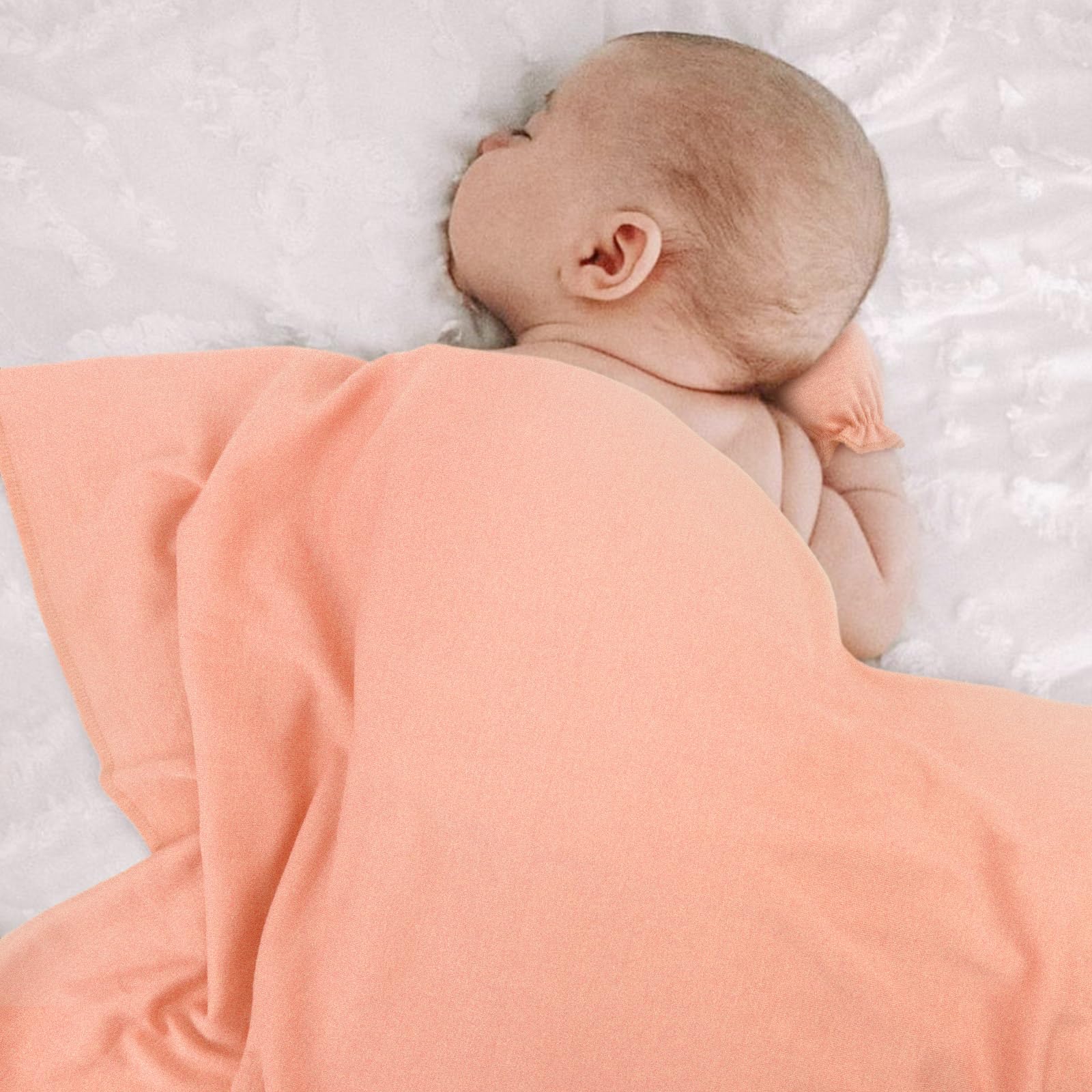 AQOKKA newborn photography scene featuring blanket for cozy, memorable nursery moments.