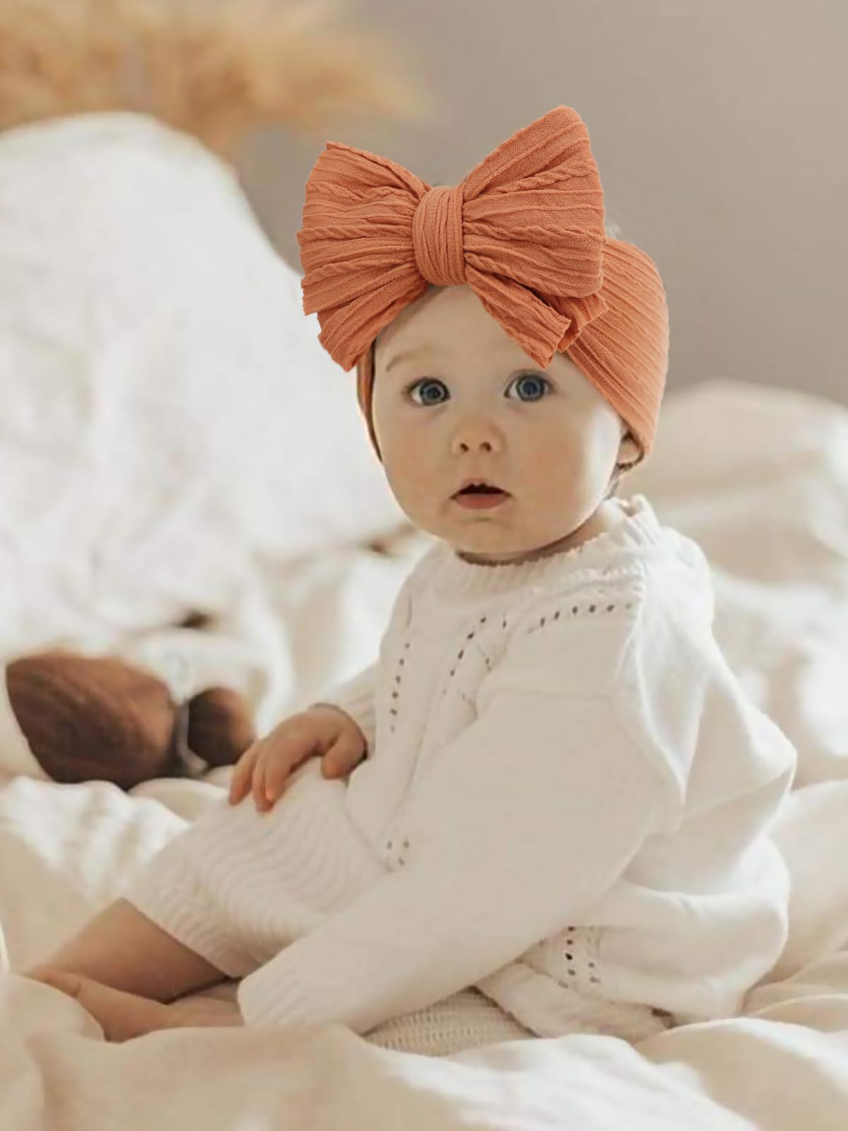 AQOKKA baby headband keeps gentle pressure without leaving marks on tiny heads.