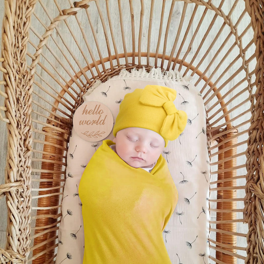 AQOKKA nursery-ready swaddle wrap display for cozy daily use.