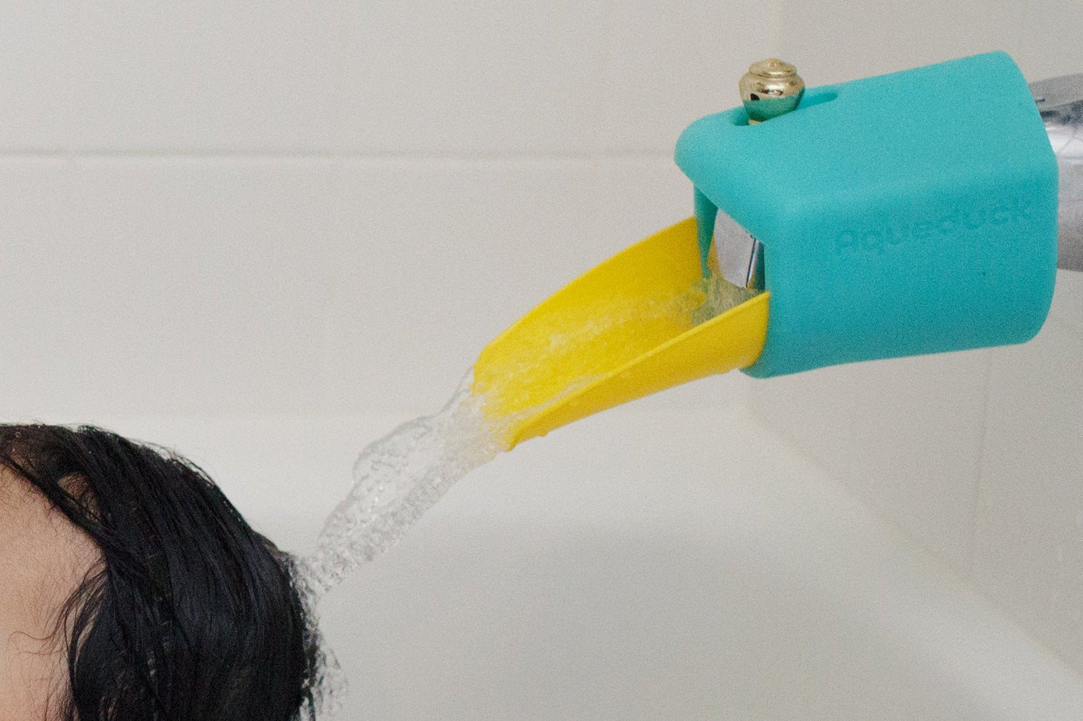 Aqueduck bath extender plus cover protects kids from cold faucet edges during baths