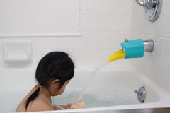 Aqueduck bath spout extender helps fill baby tubs efficiently with less water waste
