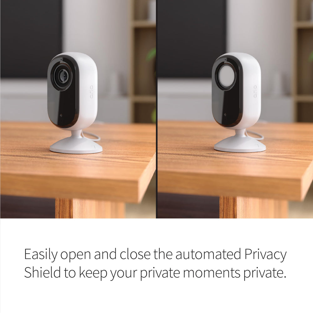 Arlo Essential Indoor Camera 2K privacy shield closes the lens for quick privacy moments.