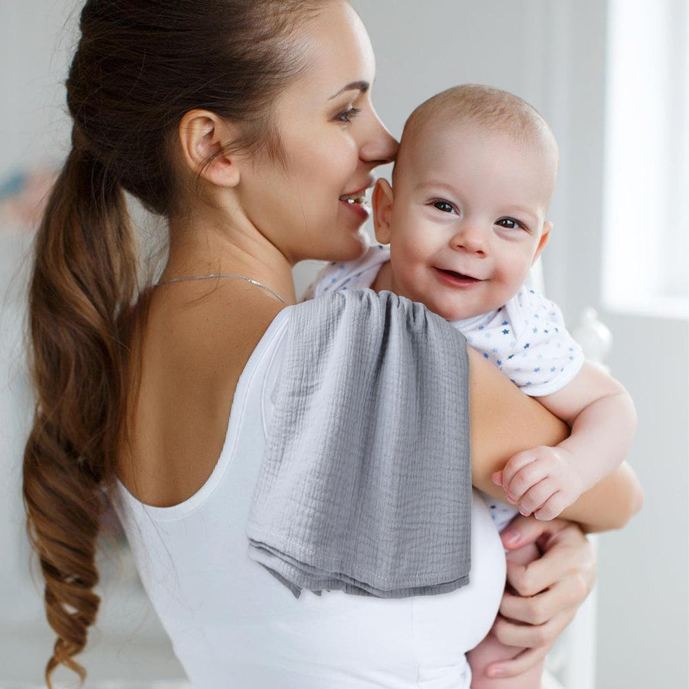 Arnzion muslin swaddle soft texture closeup emphasizes gentle, breathable weave for cozy moments