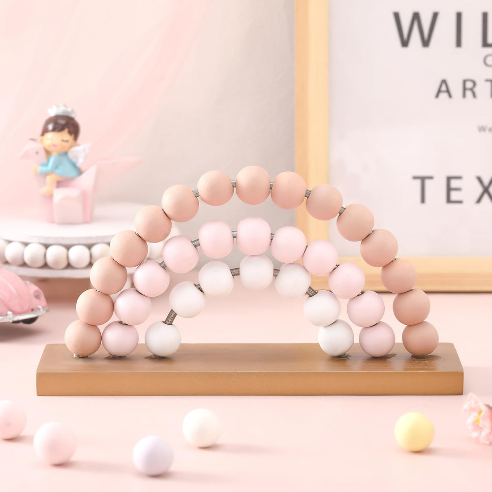 Arrowbash pink rainbow wooden decor; compact shelf display for playful learning.