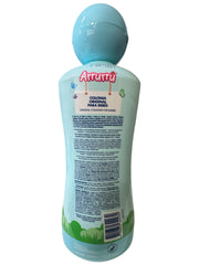 Arrurru naturals Colonia Original Azul bottle beside baby in crib for soothing scent.