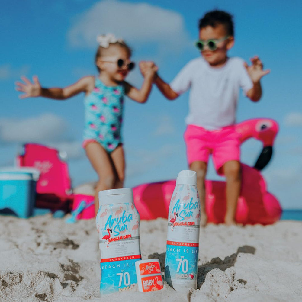 ARUBA SUN Kids SPF 70 bottle emitting bubble gum aroma during playtime