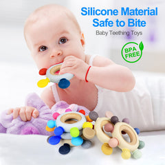 Arudyo Rainbow teether with wooden ring highlights natural materials and easy gripping for little hands.