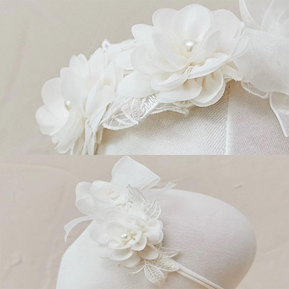 Asphinien lace big bow headband with floral motif for christenings and parties.