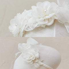 Asphinien lace big bow headband with floral motif for christenings and parties.