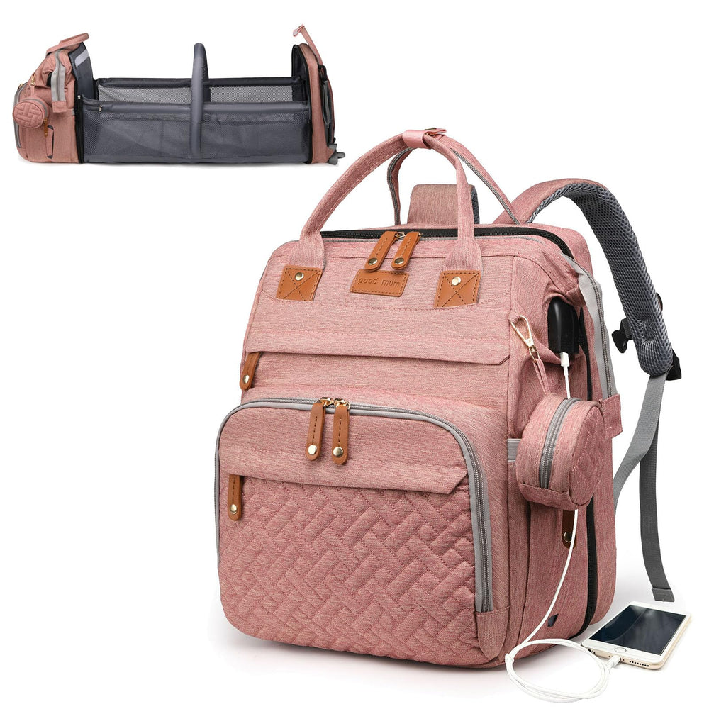 Astro alan diaper bag pink with changing station, ideal for quick diaper changes on outings.