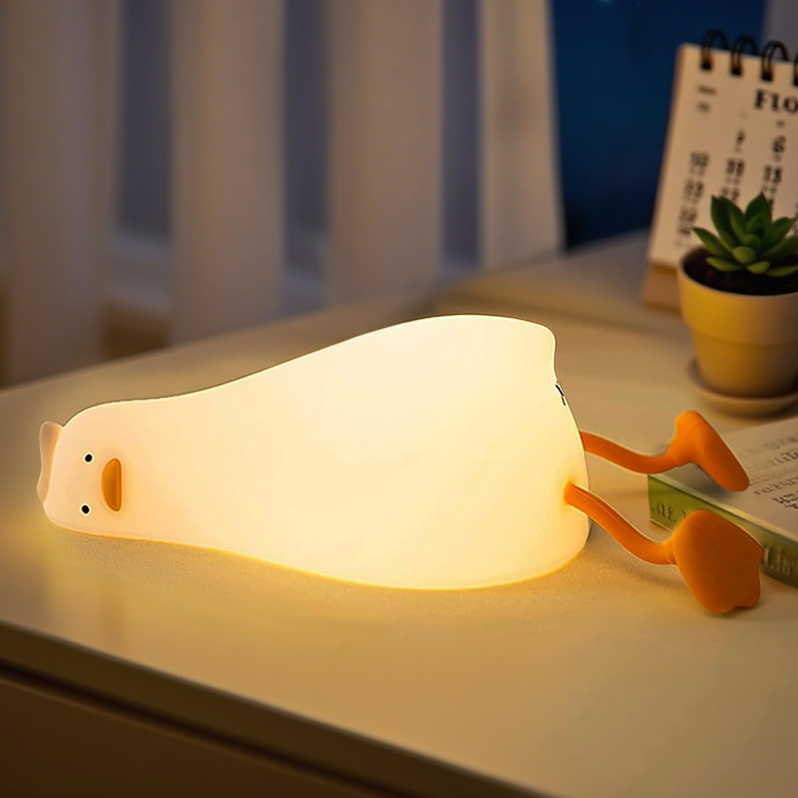 Ataraxiaqna duck night light soft glow closeup for cozy ambient lighting at bedtime