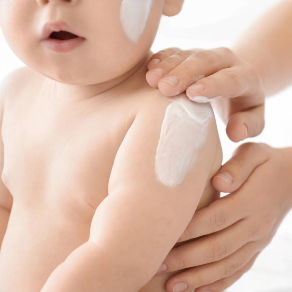ATOPALM MLE eczema cream tub closeup showing clean, hypoallergenic formula.