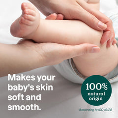 ATTITUDE plastic-free massage oil bar in hand applying gentle, quick-absorb skincare for baby