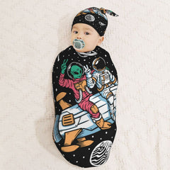 AuHomea beanie hat pairs with the swaddle for cozy head warmth.