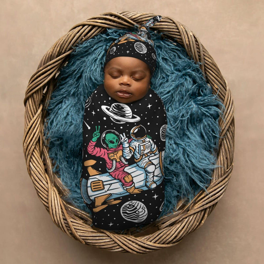 AuHomea baby-sleep-wrap in-use shows snug cocoon-style wrap during feeding.