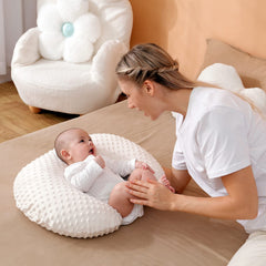 Aullar Nursing Pillow beige side view demonstrates stable baby propping