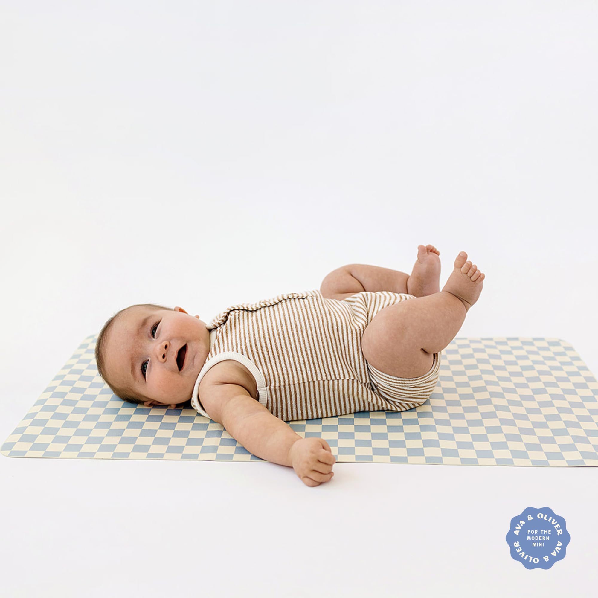 Ava + Oliver vegan leather mat Sky Checker baby-safe surface designed for little ones.