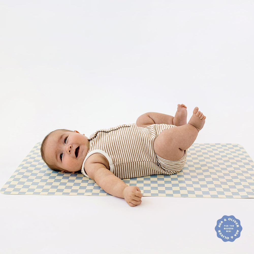 Ava + Oliver vegan leather mat Sky Checker baby-safe surface designed for little ones.