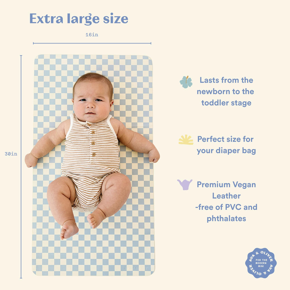 Ava + Oliver vegan leather changing mat Sky Checker wipe-clean surface for quick mess cleanup.