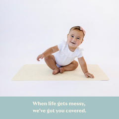 AVA + OLIVER changing mat folded travel compact palm trees design for easy diaper bag carry.