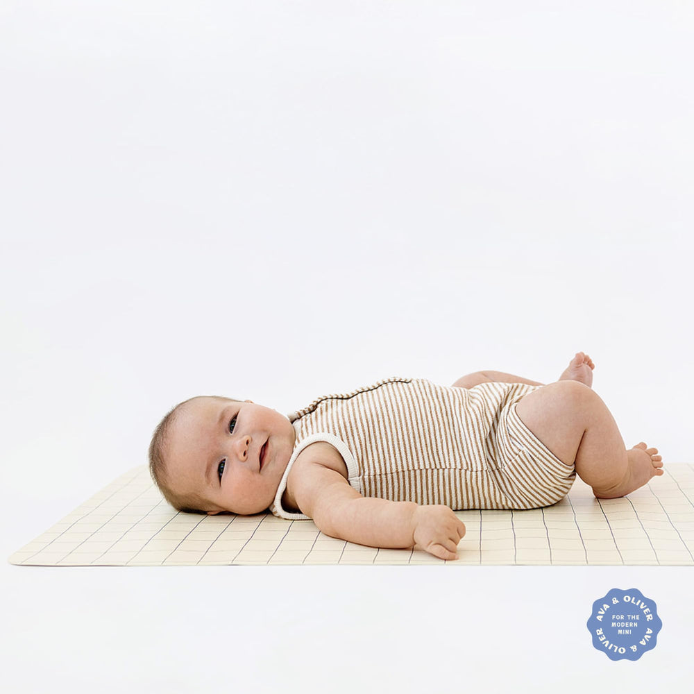 Ava + Oliver folded changing mat travel-compact in a diaper bag