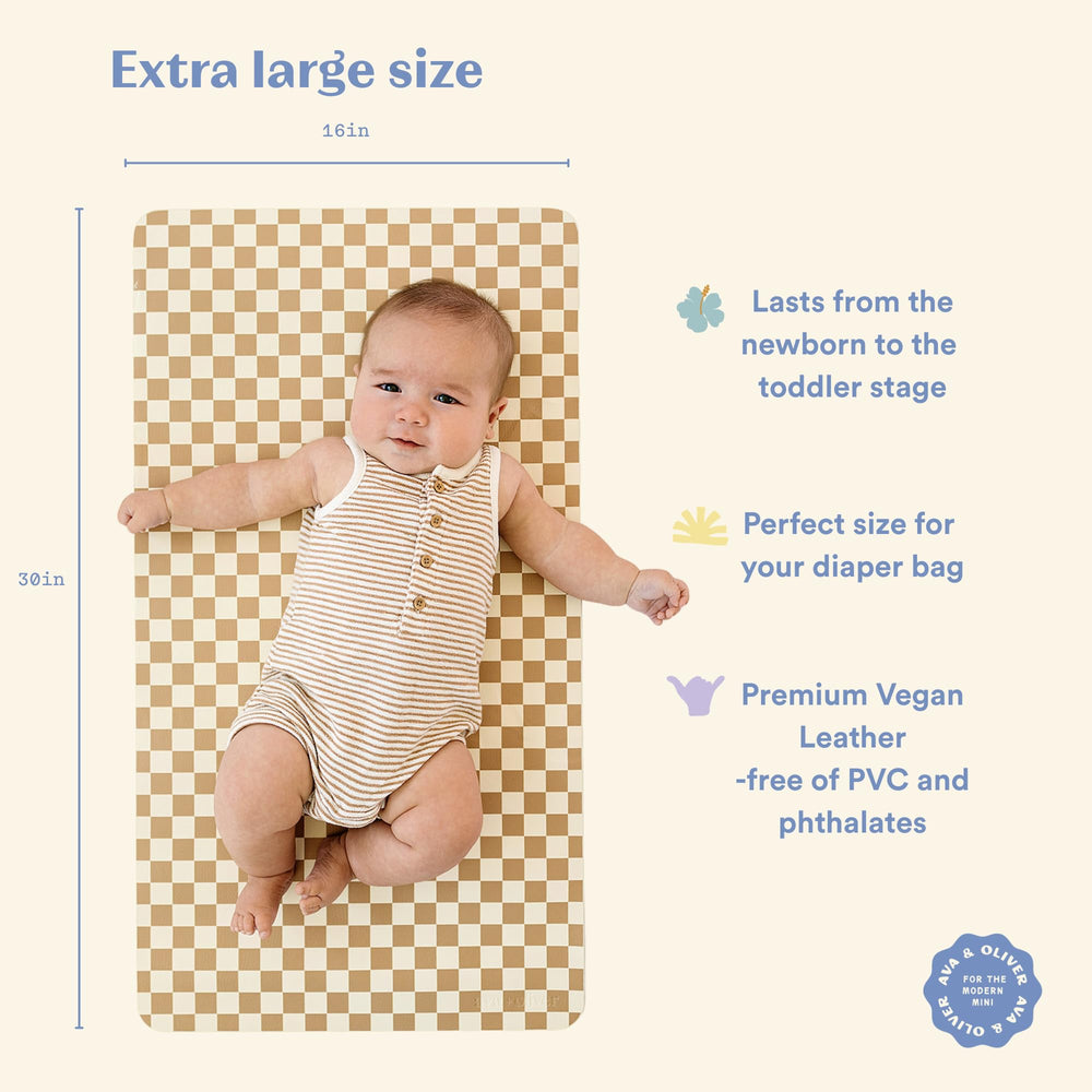 AVA + OLIVER folded travel-changing pad for on-the-go diaper changes.