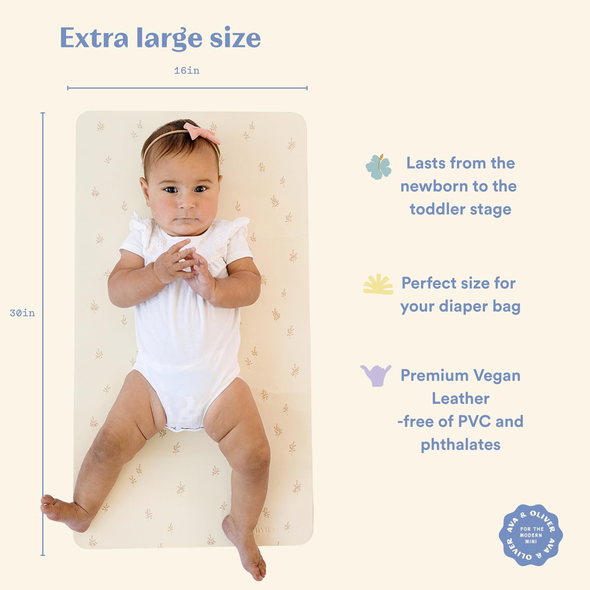 AVA + OLIVER vegan leather changing mat close-up shows soft matte texture for on-the-go changes.