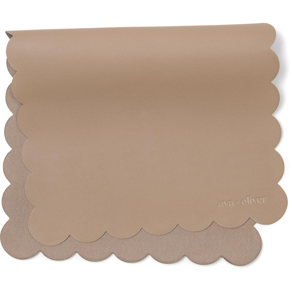 Ava + Oliver vegan leather changing mat folded for travel, compact and portable for on-the-go diapering.
