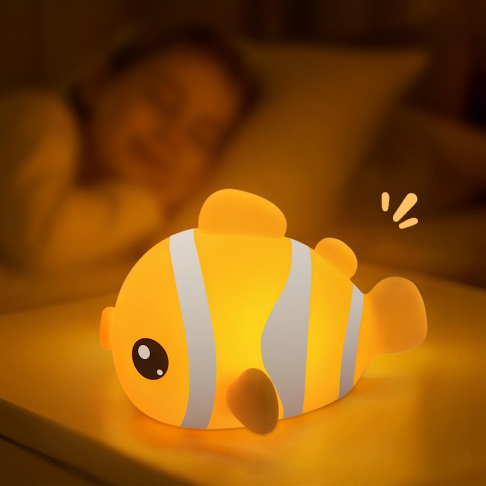 AVACOM Cute Clownfish Night Light glowing softly as a friendly bedtime companion.