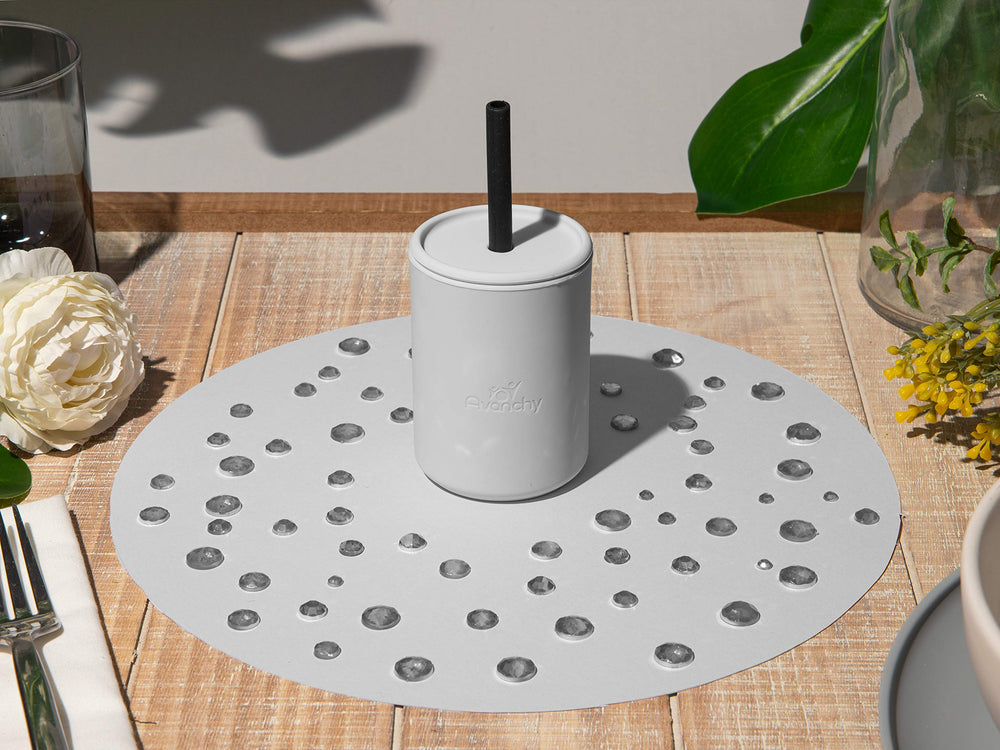 Closeup of Avanchy straw lid on gray training cup.