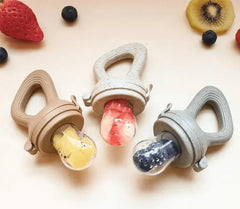 Avee & Co fresh fruit feeder beige pouch close-up demonstrates safe self-feeding with small pieces