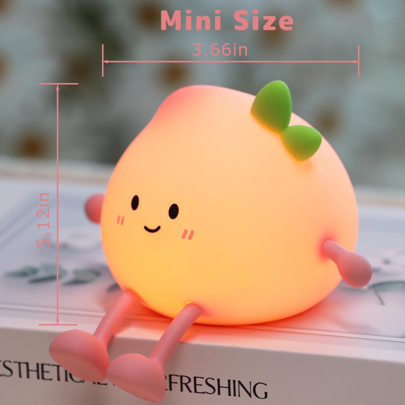 AVEKI Peach Night Light bedside setup: palm-sized silicone fits little hands at the bed.