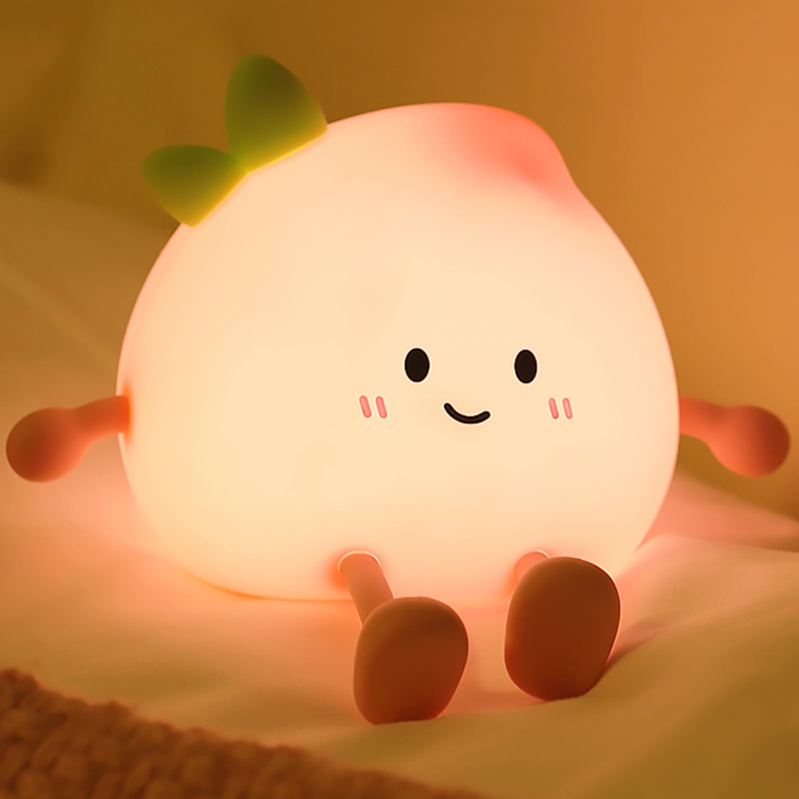 AVEKI Peach Night Light face: cute smile for calm bedtimes and safe night checks.