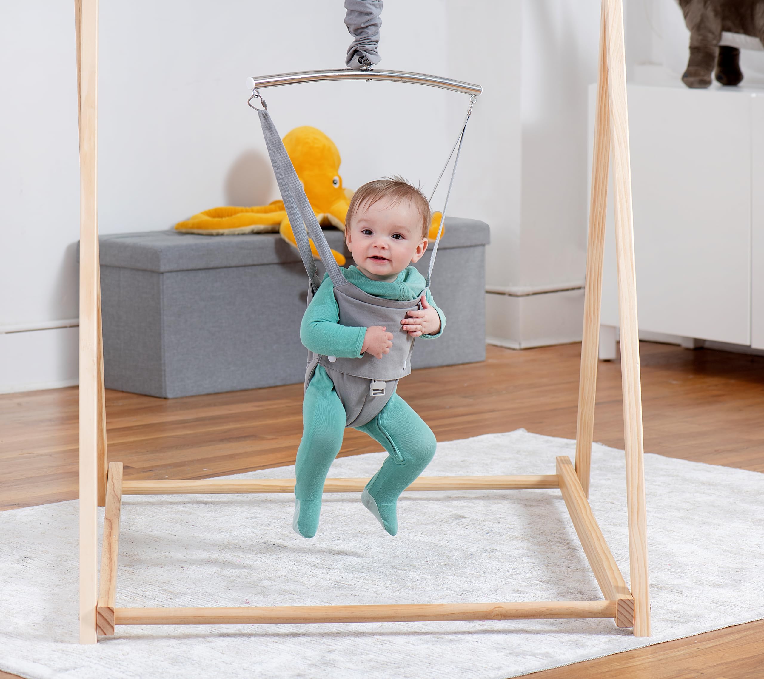 Gentle, controlled bounce of the Avenlur Tulip Bouncer promotes sensory exploration.