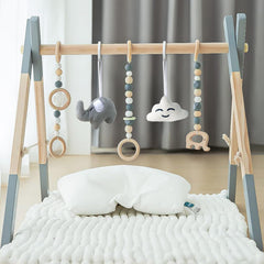 Avrsol wooden baby play gym hanging bar invites early reaching and engagement.