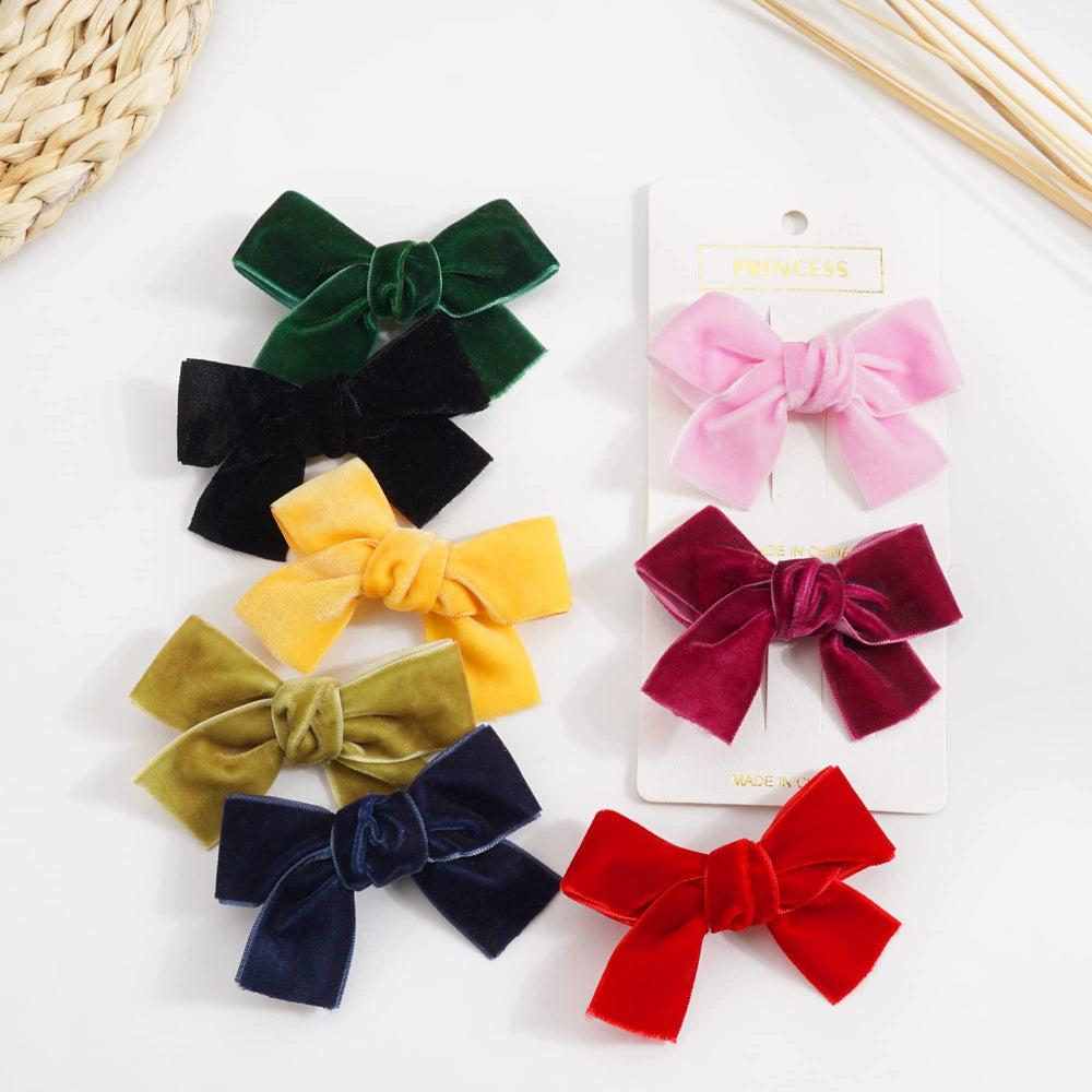 Ayesha Velvet Bows on winter outfits illustrating seasonal versatility.