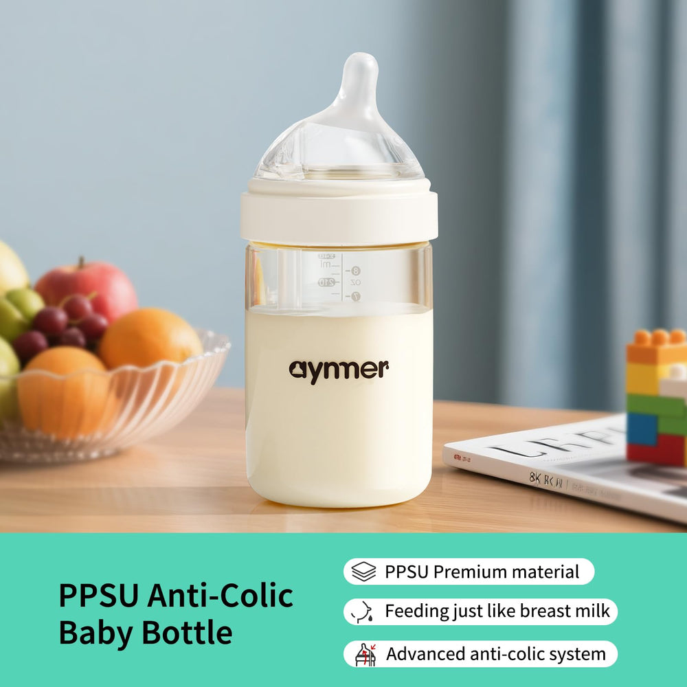 Aynmer anti-colic bottle with breathable valve reduces gas during feeding sessions.