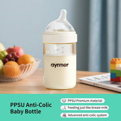 Aynmer anti-colic bottle with breathable valve reduces gas during feeding sessions.