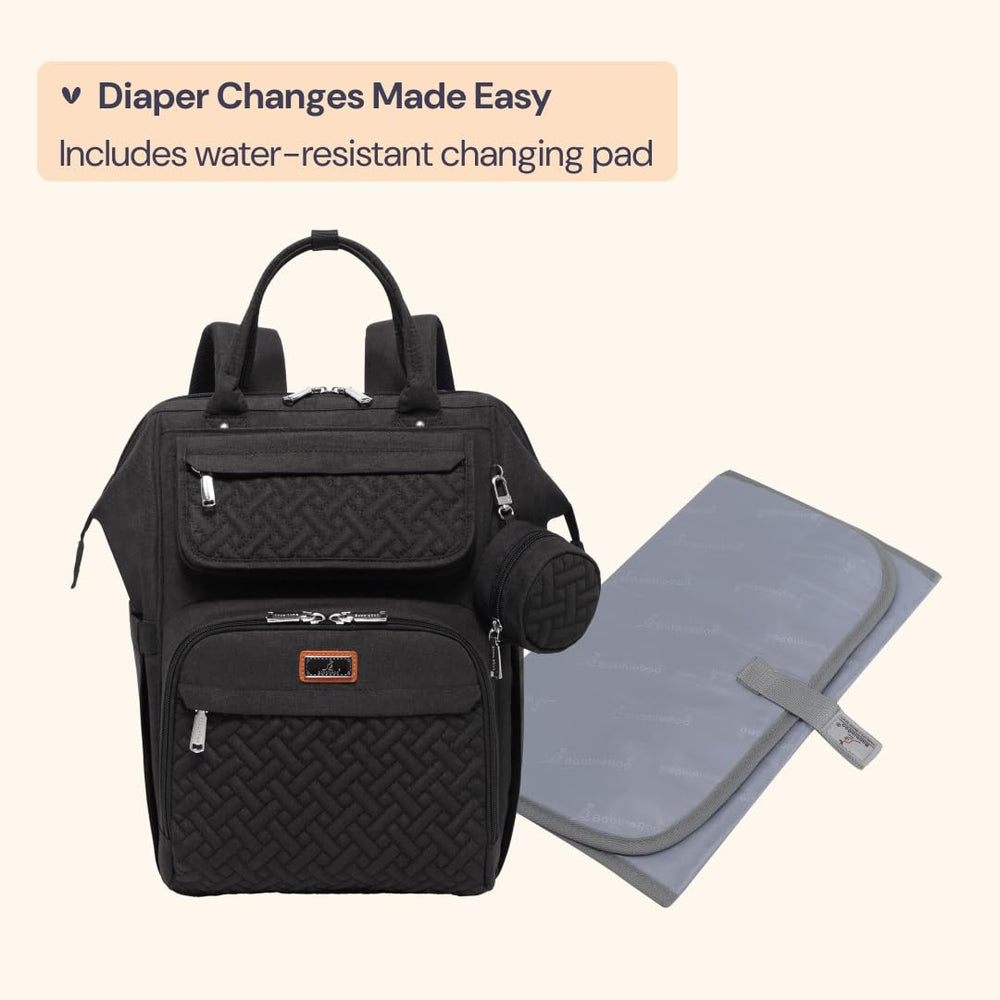 BabbleRoo diaper bag backpack multi-function-pocket accommodates tablets up to 15.6 inches.