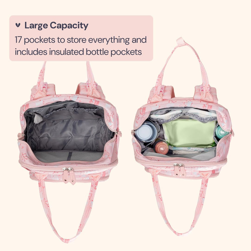 BabbleRoo pink Birdy stroller clips attached for hands-free travel convenience.