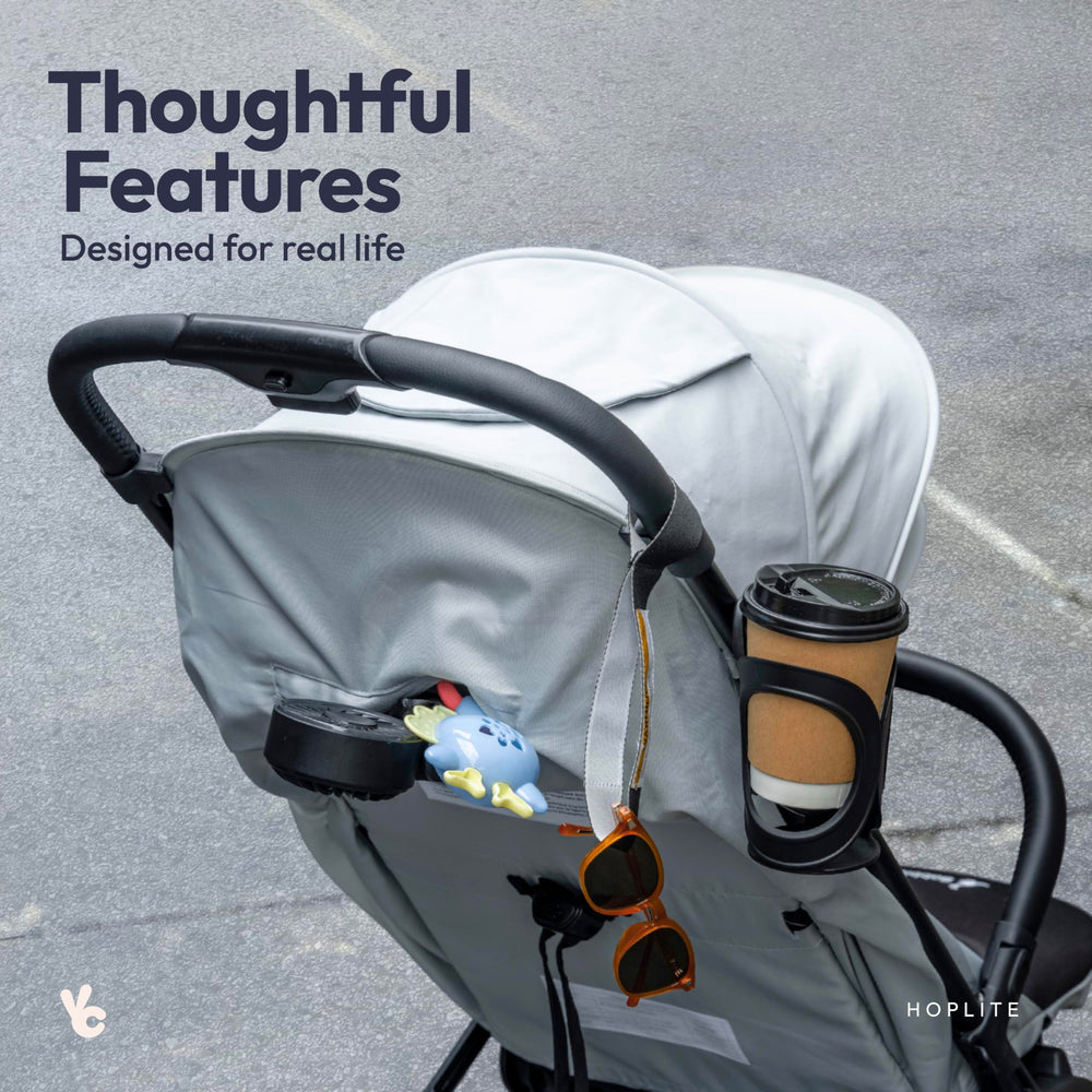 BabbleRoo Hoplite under-seat basket supports quick, accessible storage.