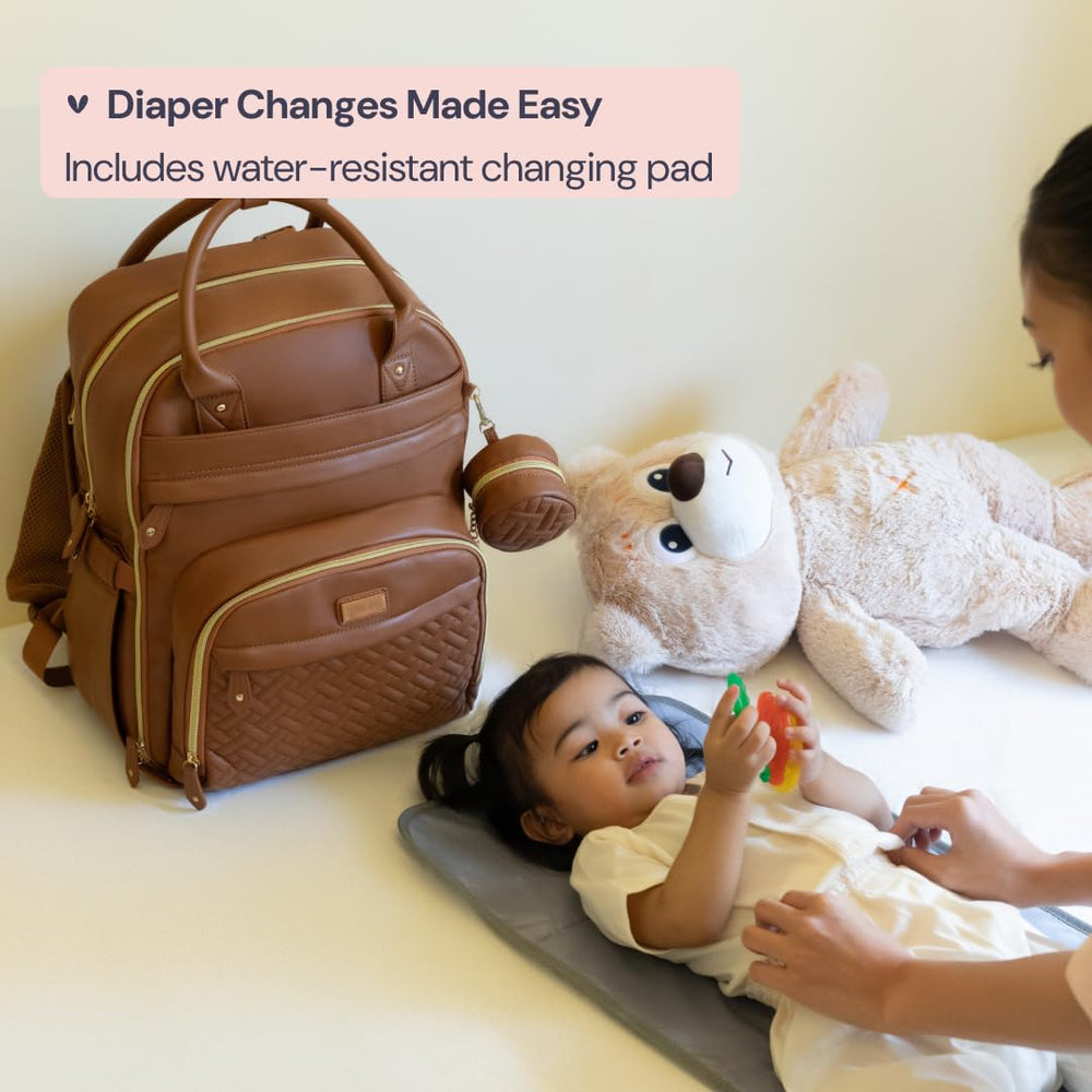 BabbleRoo Leather Diaper Bag Backpack ergonomic straps reduce shoulder fatigue.