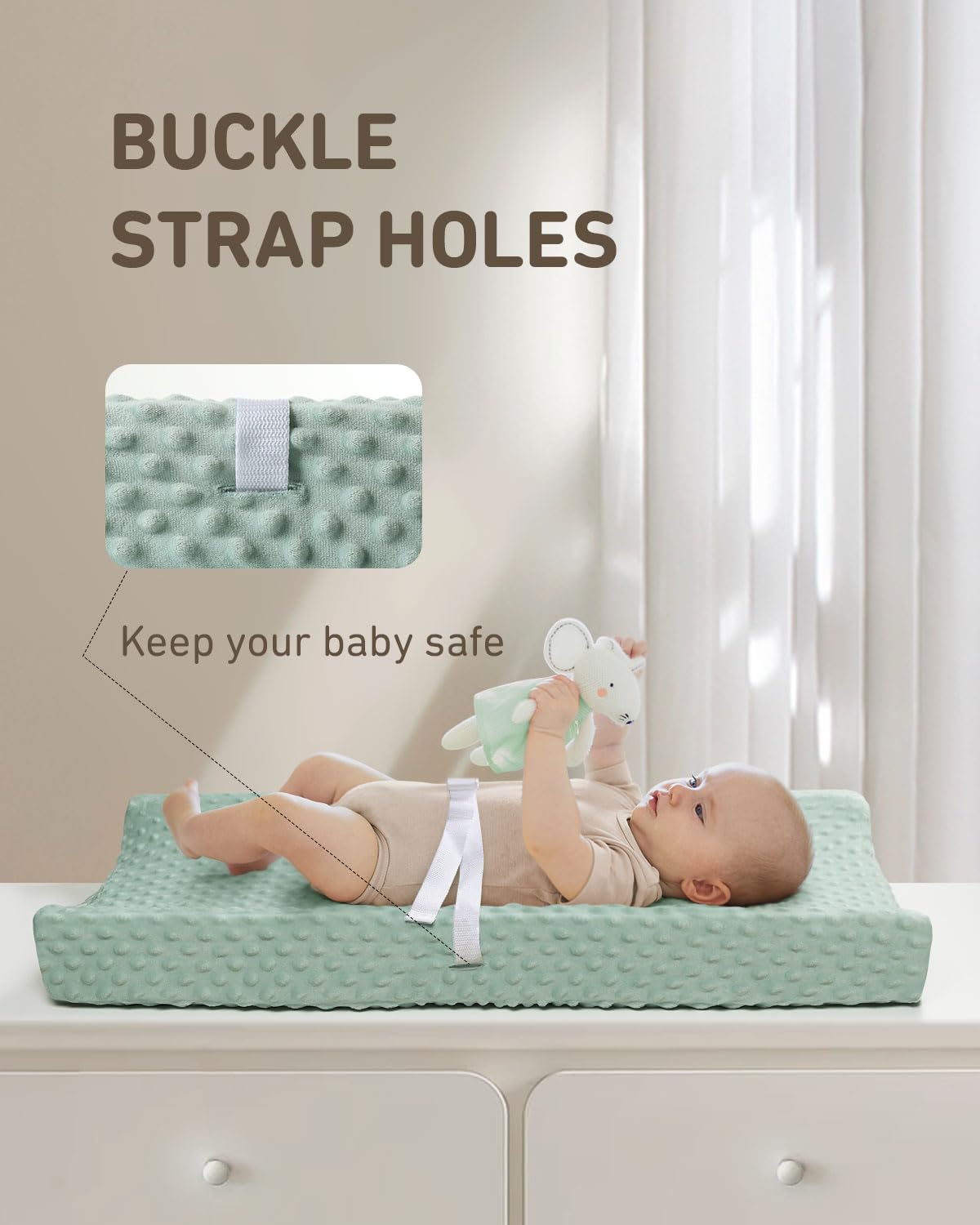 Babebay Lily White cover on changing pad demonstrates clean, bright nursery aesthetic.