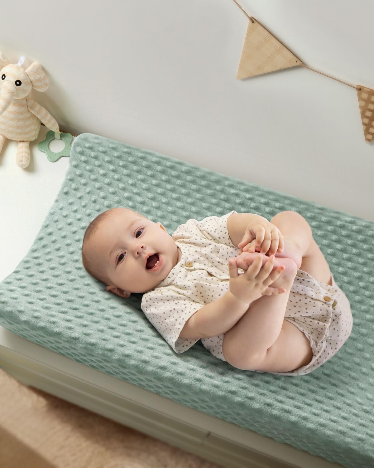 Babebay two-pack set complements nursery decor with versatile roman green and lily white colors.