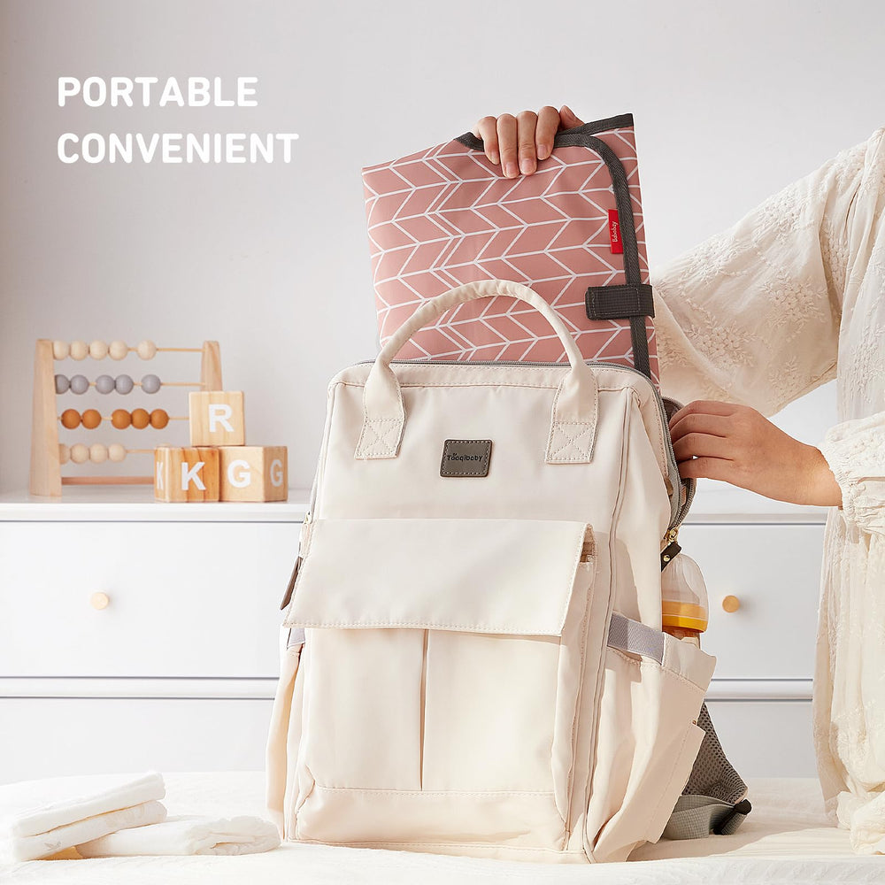 Babebay PEVA inner layer simplifies cleanup after diaper changes.