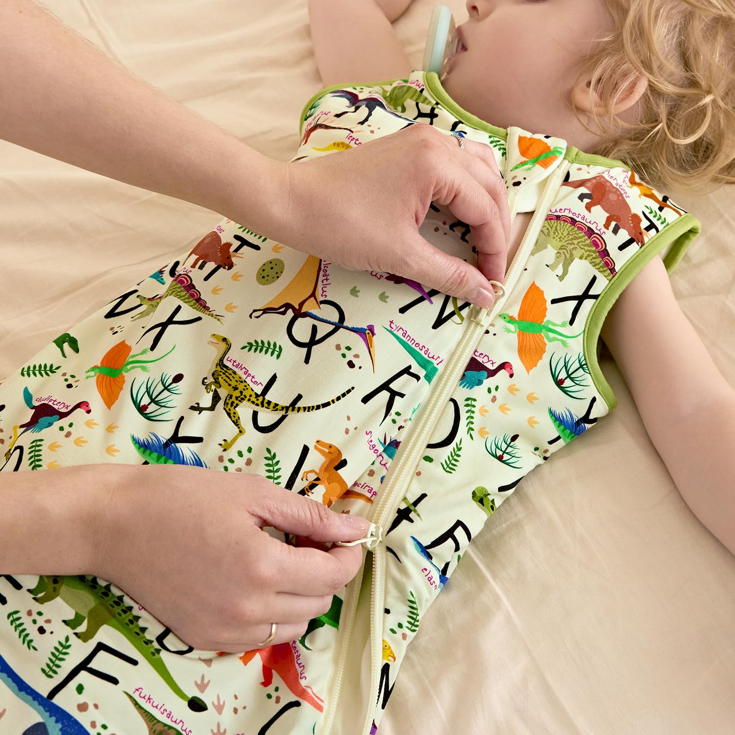 Babee Reshinee hand-drawn prints add playful style to sleep sack.