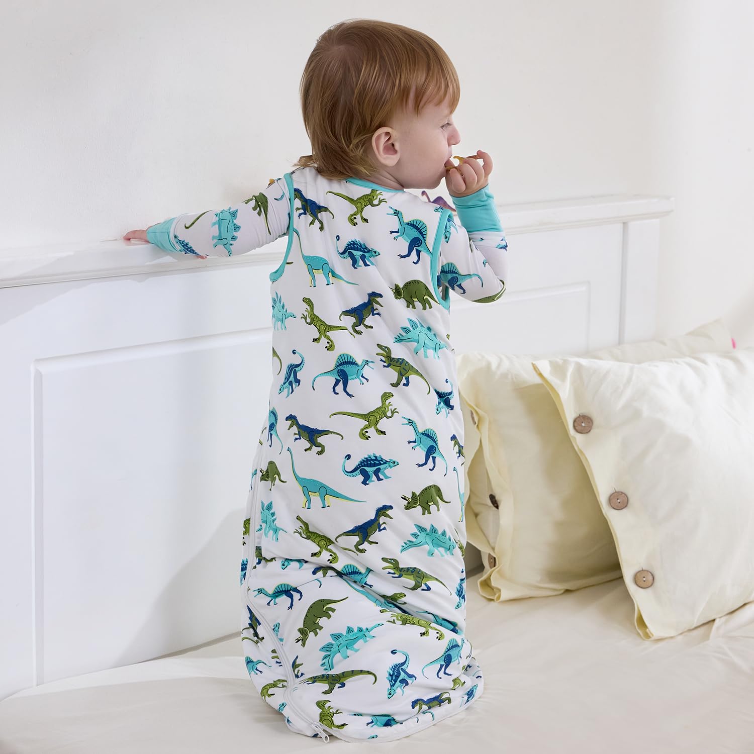 Babee Reshinee sleep sack offers relaxed fit and hip-friendly space for comfortable movement.