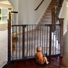 BABELIO Baby Gate side view shows stylish black wood pattern that blends with home decor and contains pets.