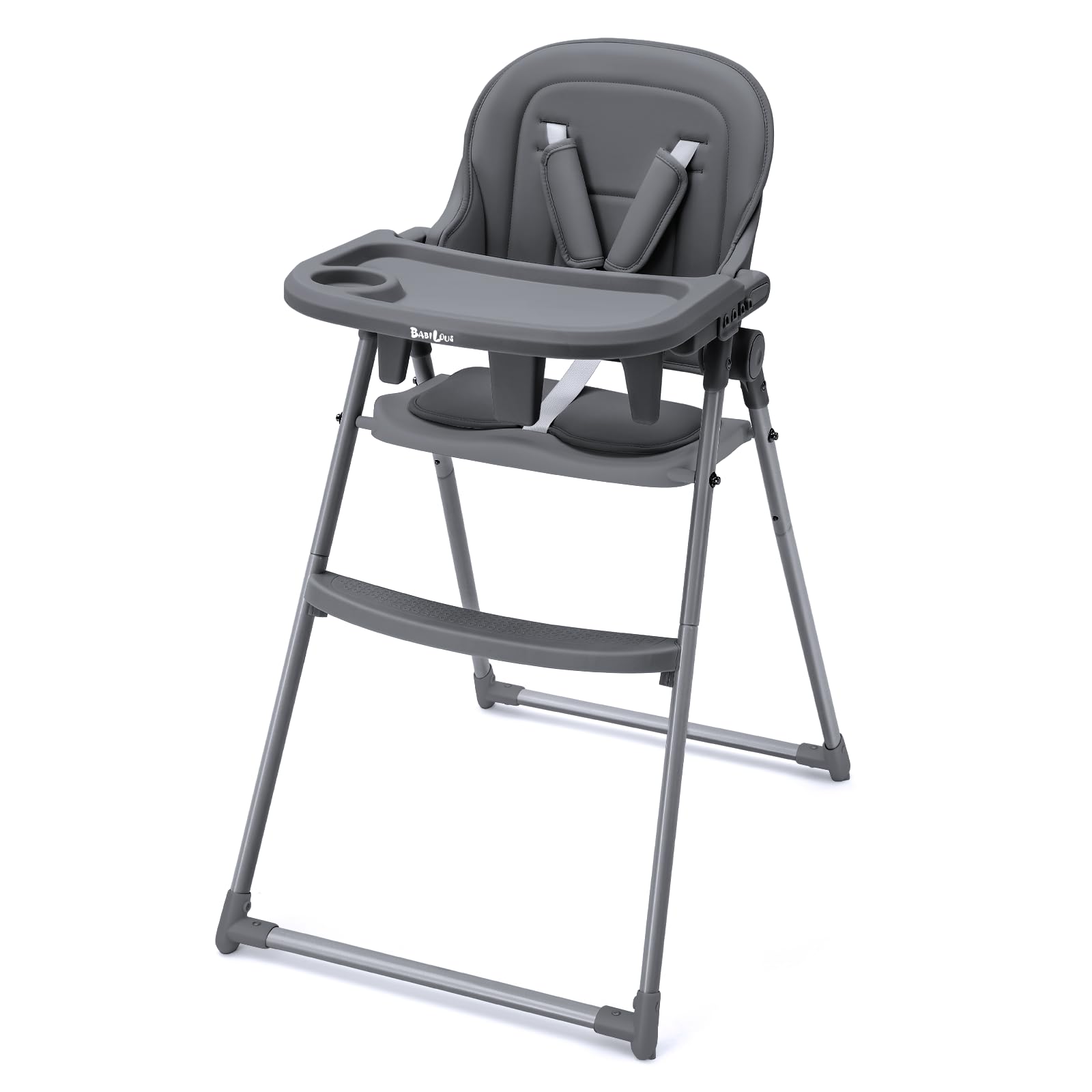 Babilous foldable high chair folded for compact storage in small kitchens.
