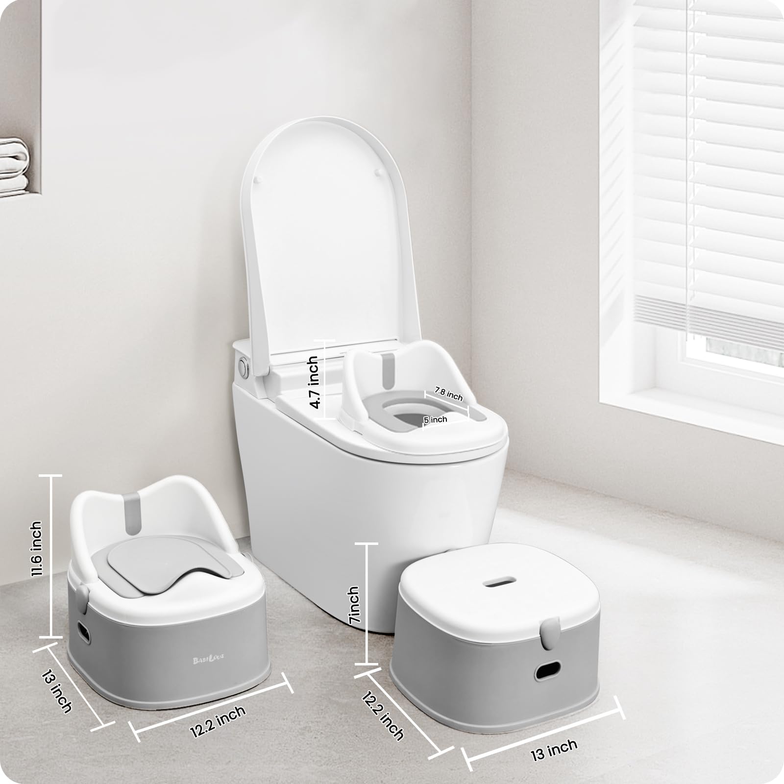 Babilous gray potty trainer in use on a home bathroom setup.